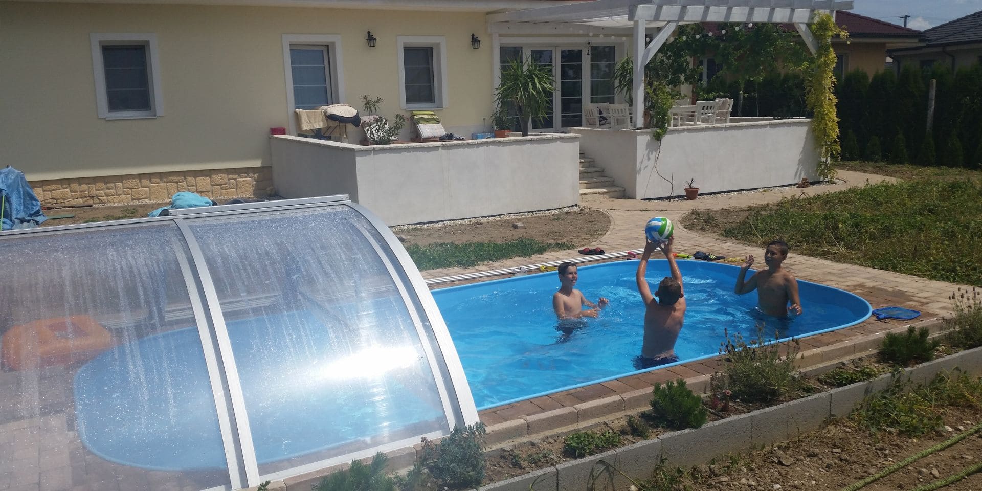 Swimming pool safety equipment including polycarbonate pool enclosure, life jackets, rescue tube and safety ring