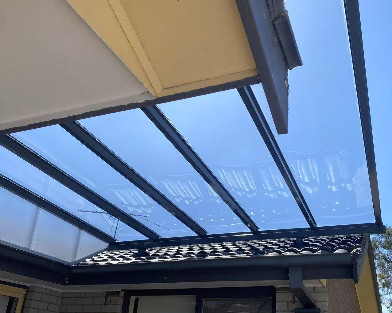 Pergola built by roof posts with side enclosed