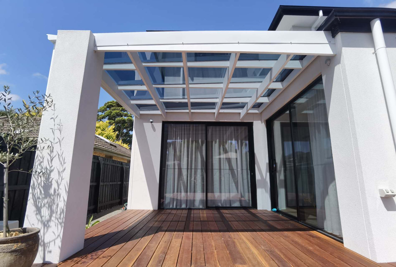 Completed polycarbonate flat sheet pergola roofing installation in Mentone, Melbourne by ExcelitePlas