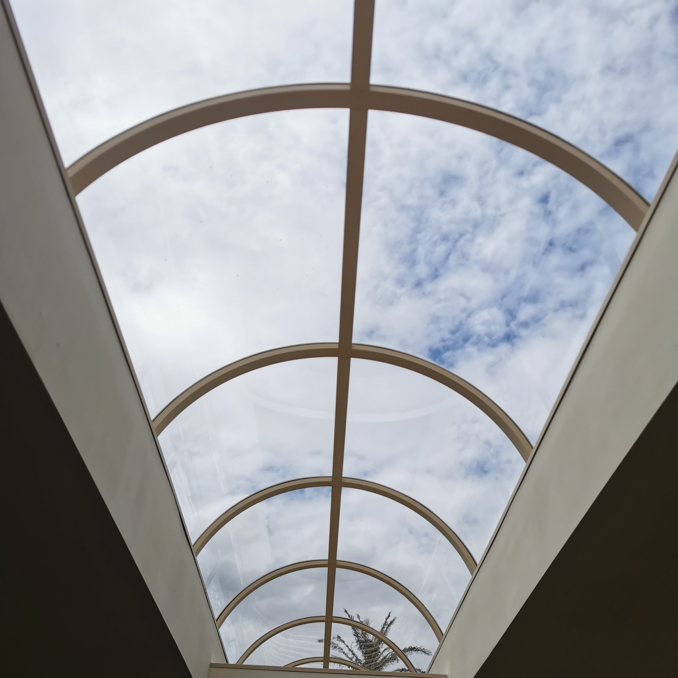 A skylight dome featuring curved polycarbonate panels 