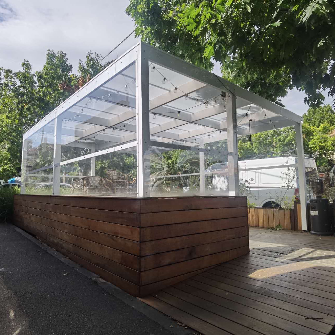 A modern outdoor Sunroom or pergola structure for a restaurant