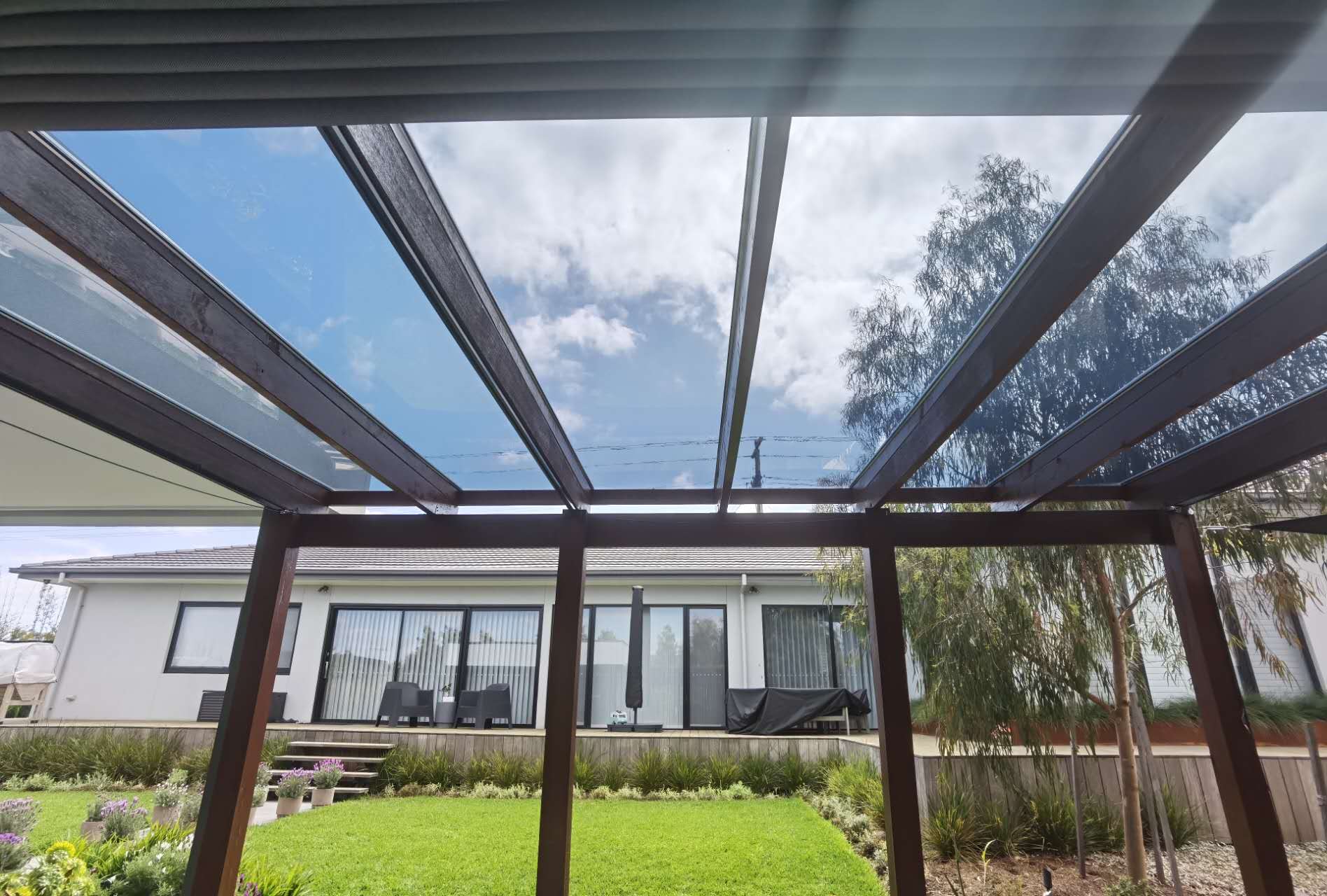 Glass like pergola roofing tinted Grey